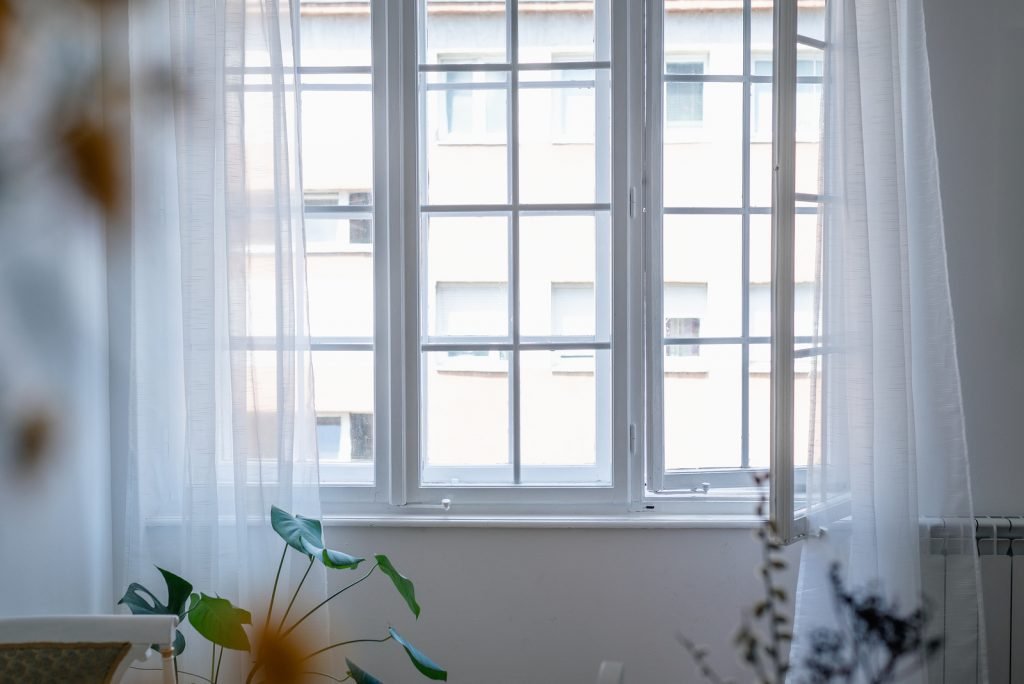 Windows in a home with curtains.